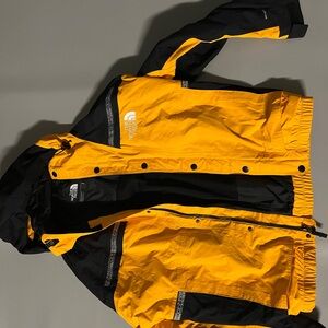 The North Face windbreaker in Yellow and Black